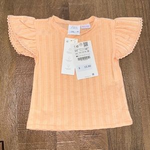 Orange shirt new with tags